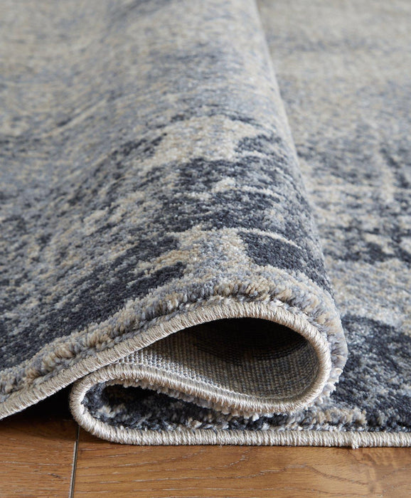 Langrich 5'3" x 7'3" Rug - Zara Furniture (Kissimmee,FL)