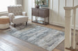 Shaymore 7'10" x 10'3" Rug - Zara Furniture (Kissimmee,FL)