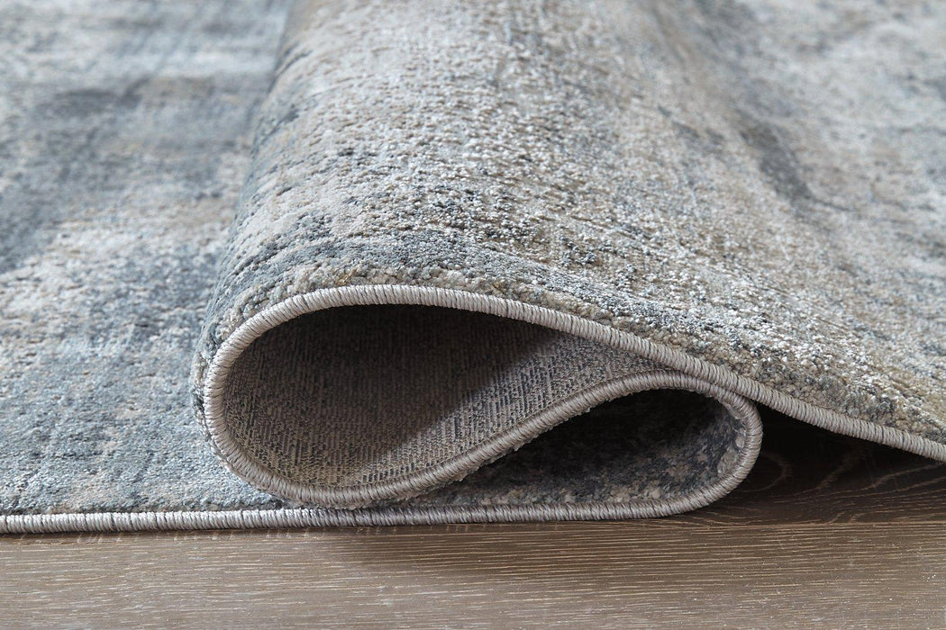 Shaymore 7'10" x 10'3" Rug - Zara Furniture (Kissimmee,FL)