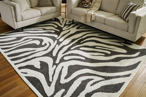 Thomwith 7'10" x 10'1" Rug - Zara Furniture (Kissimmee,FL)