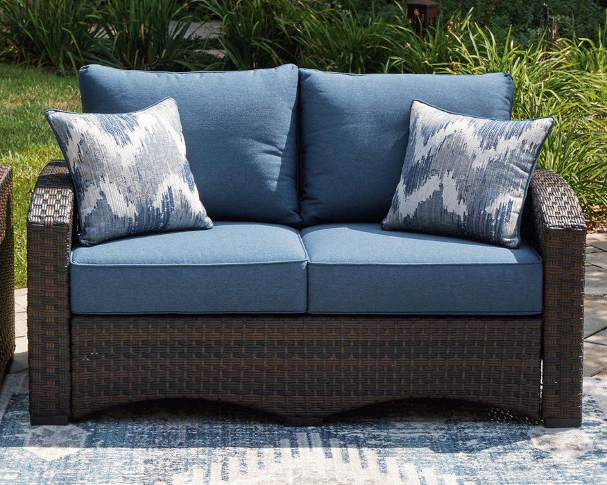 Windglow Outdoor Loveseat with Cushion - Zara Furniture (Kissimmee,FL)