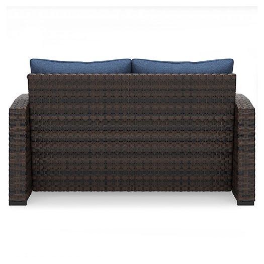 Windglow Outdoor Loveseat with Cushion - Zara Furniture (Kissimmee,FL)