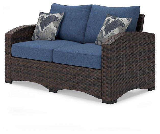 Windglow Outdoor Loveseat with Cushion - Zara Furniture (Kissimmee,FL)