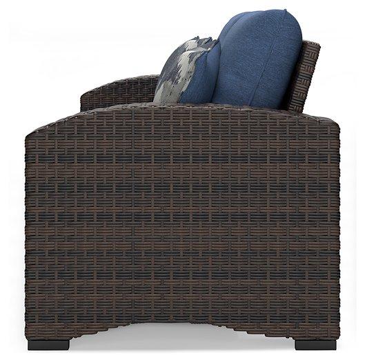 Windglow Outdoor Loveseat with Cushion - Zara Furniture (Kissimmee,FL)