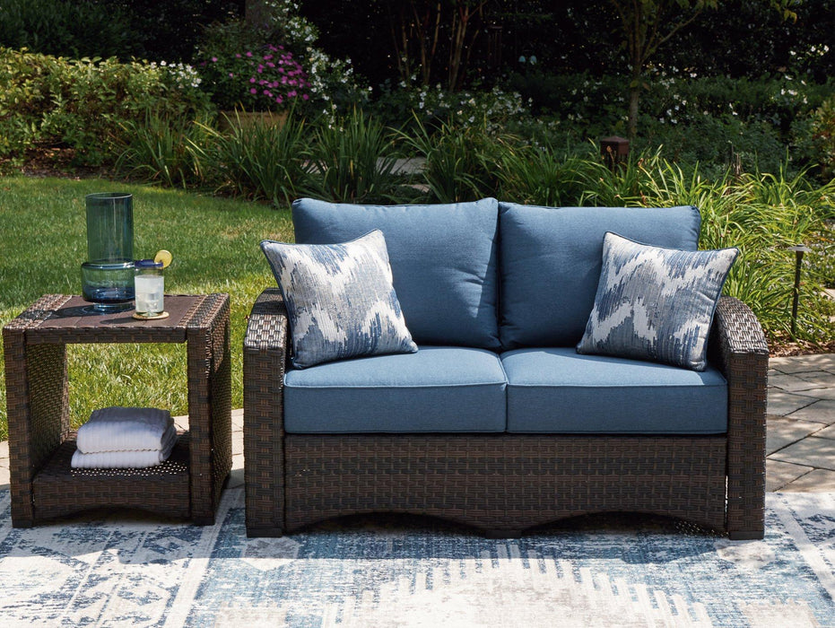 Windglow Outdoor Loveseat with Cushion - Zara Furniture (Kissimmee,FL)