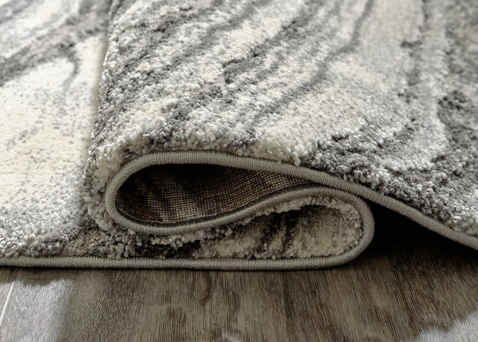 Wysdale 7'10" x 10'3" Rug - Zara Furniture (Kissimmee,FL)
